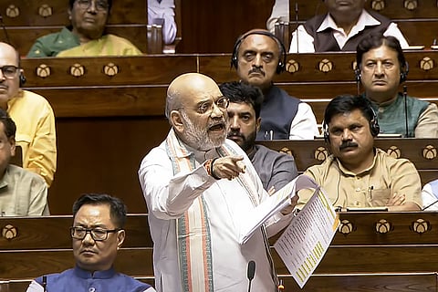  Union Home Minister Amit Shah speaks during a debate in the Rajya Sabha on the Pahalgam terror attack and Operation Sindoor, at the Monsoon session of Parliament, in New Delhi, Wednesday, July 30, 2025. 