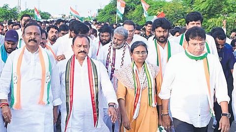 TPCC chief Mahesh Kumar Goud and AICC Telangana in-charge Meenakshi Natarajan lead the Janahita Padayatra in the Pargi Assembly constituency on Thursday
