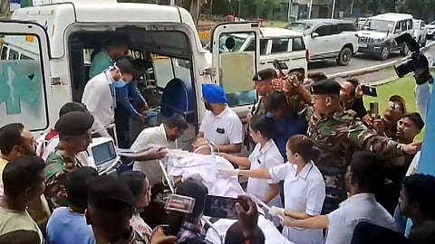 Jharkhand Minister Ramdas Soren being brought to a hospital after he allegedly fell in his house, in Jamshedpur, Saturday, Aug. 2, 2025. 