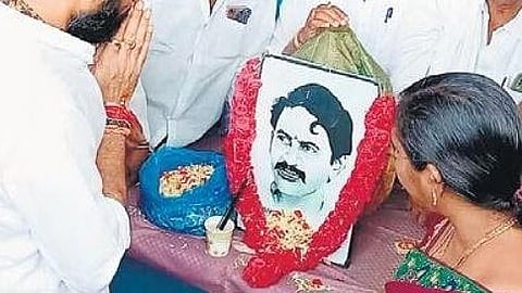 A political leader paying tribute to Vangaveeti Ranga at Gudivada.