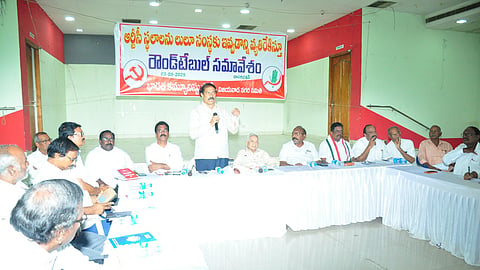 Communist Party of India (CPI) State secretary K Ramakrishna addressing a roundtable meeting at Dasari Bhavan on Sunday.