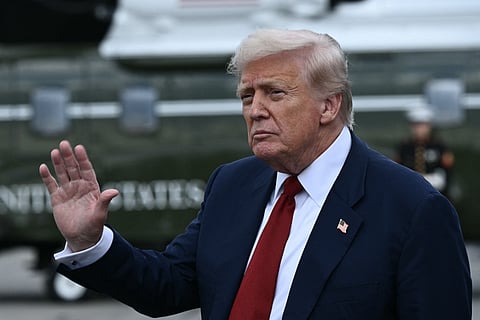 US President Donald Trump waves before boarding Marine One at Lehigh Valley International Airport in Allentown, Pennsylvania, on August 1, 2025, on his way to his residence in Bedminster, New Jersey, where he will spend the weekend.