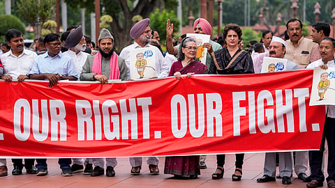 Congress MPs Sonia Gandhi and Priyanka Gandhi Vadra with other parliamentarians of the INDIA bloc parties stage a protest against the Election Commission's Special Intensive Revision (SIR) of electoral rolls in Bihar, during the Monsoon session of Parliament, in New Delhi, Tuesday, Aug. 5, 2025
