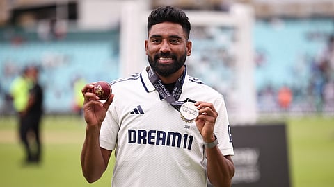 India's Mohammed Siraj poses with the match ball and his medal after India win the final Test cricket match between England and India at The Oval in London on August 4, 2025. 