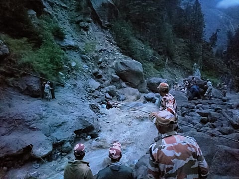 Rescue team assisting stranded pilgrims during the nine-hour overnight operation following the flash flood that hit the Kinnaur Kailash Yatra route in Himachal Pradesh on Aug 5, 2025.
