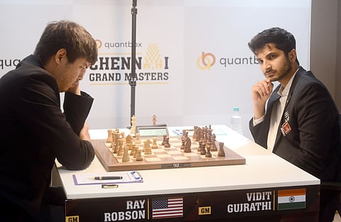 Ray Robson of USA and India's Vidit Gujrathi during the second round on Friday 