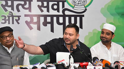 LoP in the Bihar Assembly and RJD leader Tejashwi Yadav addresses a press conference, in Patna, Sunday, Aug. 10, 2025. 