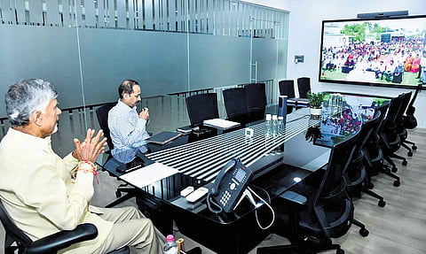 Chief Minister N Chandrababu Naidu interacted with residents of Bhagat Singh Colony in Nellore City after distributing land-title deeds in a virtual event 