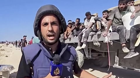 This undated recent image, taken from video broadcast by the Qatari-based television station Al Jazeera, shows the network’s Arabic-language Gaza correspondent, Anas al-Sharif, reporting on camera in Gaza. Al-Sharif and four other Al Jazeera staff members were killed by an Israeli drone strike on their tent in Gaza City shortly before midnight on Sunday. 