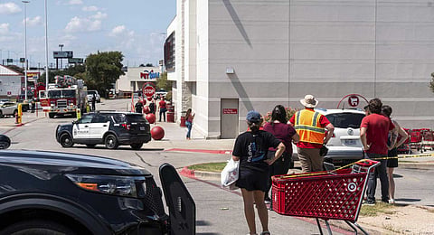 Law enforcement investigates a shooting at Target off Research Boulevard, near Ohlen Road in Austin, Texas, Monday, Aug. 11, 2025.