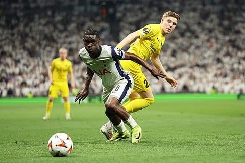 Tottenham's Yves Bissouma, front, and Glimt's Jens Petter Hauge compete for the ball during the Europa League semifinal first leg soccer match between Tottenham Hotspur and Bodo/Glimt on May 1, 2025. 