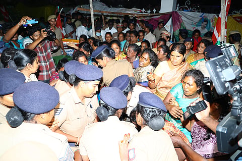 The protesters being forcefully evicted.
