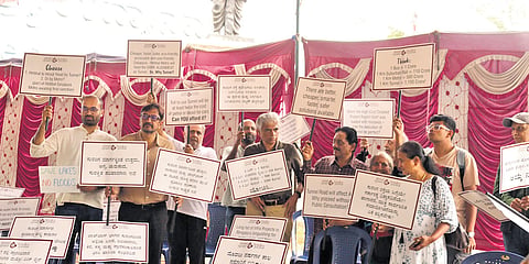 Citizens from all walks of life, including actor-director Prakash Belawadi, hold p[lacards demanding better public transport and protection of city’s ecosystems