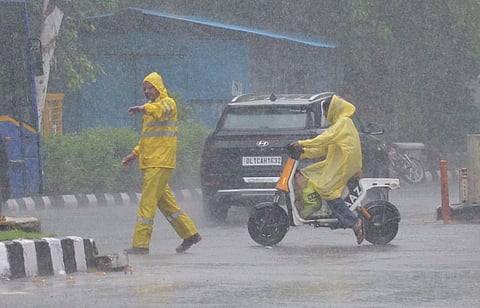 Heavy rain lashes capital after sweltering heat in morning, leaves several areas waterlogged.