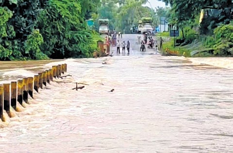 A low-lying bridge submerged in Malkangiri district following heavy rains 