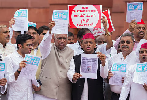 LoP in the Rajya Sabha and Congress President Mallikarjun Kharge, Samajwadi Party MP Akhilesh Yadav, TMC MPs Abhishek Banerjee and Kalyan Banerjee, along with other parliamentarians from the INDIA bloc parties, stage a protest against the Election Commission's Special Intensive Revision (SIR) of electoral rolls in Bihar, during the Monsoon session of Parliament, in New Delhi, Monday, Aug. 18, 2025. 