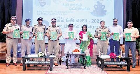 Minister Ponnam Prabhakar, along with senior officials, unveils the ‘Ganesh Immersion Action Plan’ guide in Hyderabad on Tuesday
