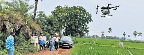 Agriculture authorities demonstrate how to spray nano urea using drones at Metpalli village in Karimnagar district on Thursday
