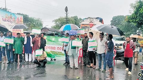 Agitators staging blockade on NH-55 at Bhima Bhoi chowk on Friday 