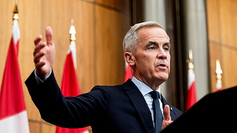 Canadian Prime Minister Mark Carney speaks during a news conference at the National Press Theatre in Ottawa on Friday, Aug. 22, 2025.