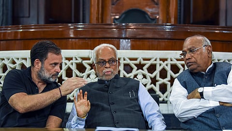 INDIA bloc's vice-presidential nominee, former Supreme Court Judge B. Sudershan Reddy, in conversation with Congress leaders Rahul Gandhi and Mallikarjun Kharge in the Central Hall of Samvidhan Sadan, in New Delhi.