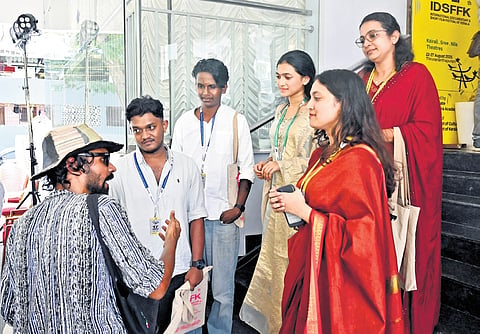 A director engaging with the audience after a film screening at the IDSFFK in Thiruvananthapuram on Saturday 