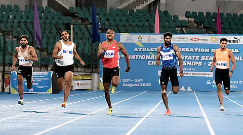Animesh Kujur (C) stopped the clock at 20.63 seconds to capture gold on Saturday 