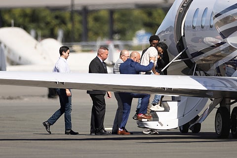 Harjinder Singh is escorted onto an airplane by Florida Lt. Gov. Jay Collins and law enforcement on Aug. 21, 2025, in Stockton, Calif. 