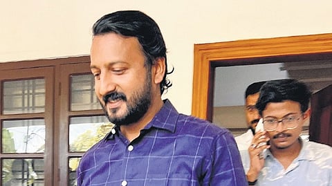 Congress leader and MLA Rahul Mamkootathil steps out of his 
house at Adoor in Pathanamthitta 