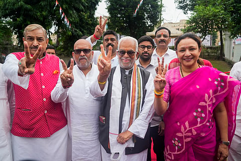 Opposition's vice-presidential candidate B Sudarshan Reddy with Uttar Pradesh Congress President Ajay Rai, party leader Pramod Tiwari and others during a meeting, in Lucknow, Tuesday, Aug. 26, 2025. 