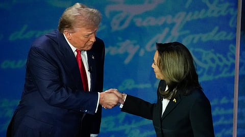 Donald Trump and  Kamala Harris shake hands before the start of an ABC News presidential debate at the National Constitution Center, Tuesday, Sept. 10, 2024.