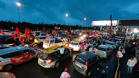  Supporters of activist Manoj Jarange Patil on their way to Mumbai's Azad Maidan to participate in his Maratha reservation protest, at Vashi Toll Plaza, in Navi Mumbai, Friday, Aug. 29, 2025