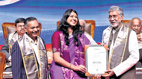 Nobel Peace Laureate Kailash Satyarthi presents a Master of Design degree certificate to Tulasi Mukunda during the convocation ceremony of  RV University in Jayanagar on Saturday