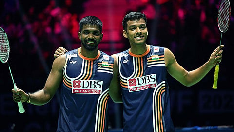 India’s Satwiksairaj Rankireddy and Chirag Shetty celebrate after beating Malaysia’s Aaron Chia and Wooi Yik Soh in the men’s double quarter-final match at the Badminton BWF World Championships at the Adidas Arena in Paris, on August 29, 2025. 