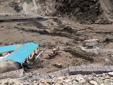Roads blocked or washed away in landslides following heavy rains in Himachal Pradesh.