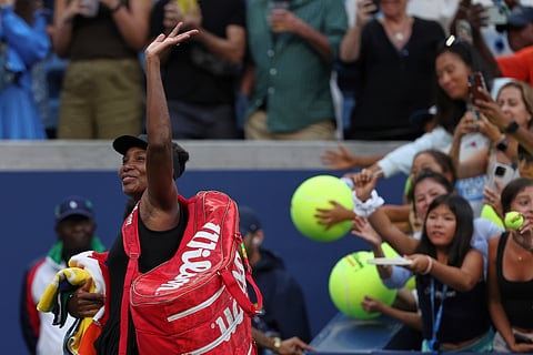 Venus Williams, of the United States, acknowledges the crowd after losing quarterfinal doubles match with parter Leylah Fernandez, of Canada, at the U.S. Open tennis championships, Tuesday, Sept. 2, 2025, in New York. 