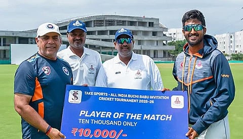 Vidyuth receiving the player of the match award after the semi-final against Jammu and Kashmir