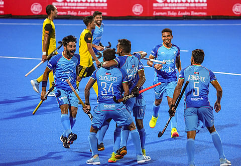 India celebrate a goal against Malaysia
