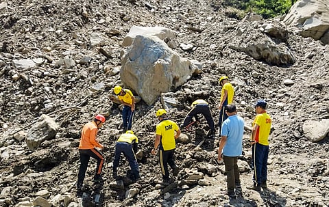  SDRF personnel and others during a search and rescue operation at a cloudburst-hit village, in Rudraprayag district, Uttarakhand, Saturday, Sept. 6, 2025.