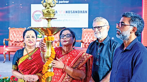 Speaker of Odisha Assembly Surama Padhy lights ceremonial lamp, inaugurating the Devi Awards in presence of TNIE editorial director Prabhu Chawla, CEO of TNIE Group Lakshmi Menon and resident editor Siba Mohanty.