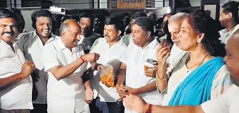 CP Radhakrishnan’s family and BJP cadres celebrate by distributing sweets in Tiruppur after he was elected the new vice president on Tuesday.