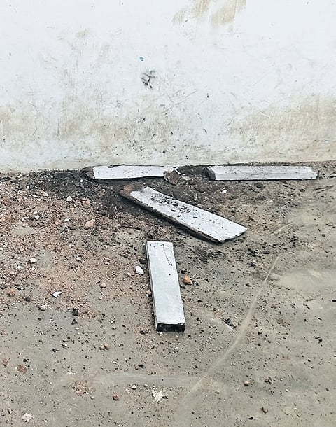 The wooden planks of the roof in 
the final-year Malayalam classroom at Maharaja’s College that fell apart.