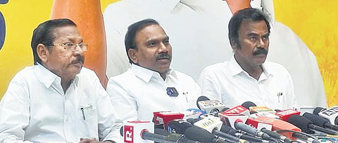 A Raja and RS Bharathi addressing reporters at Anna Arivalayam.
