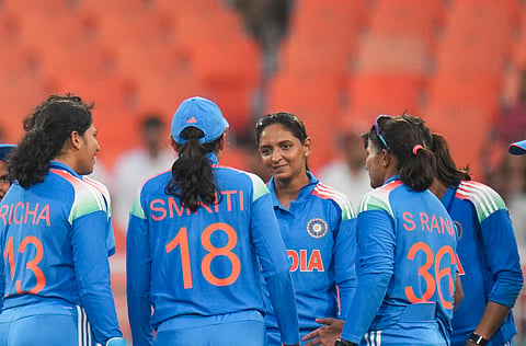 The Indian team in a huddle