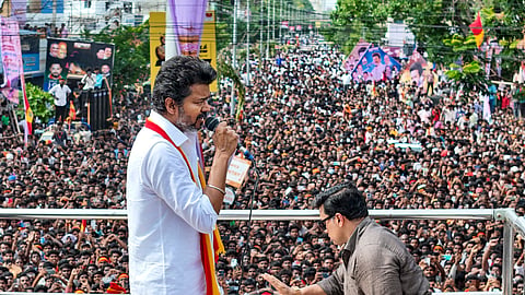  Tamilaga Vettri Kazhagam (TVK) chief and actor Vijay addresses supporters during a rally, in Tiruchirapalli district, Tamil Nadu, Saturday, Sept. 13, 2025.