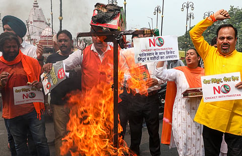 Shiv Sena (UBT) workers shout slogans during a protest against the India-Pakistan Asia Cup cricket match, in Jammu, Sunday, Sept. 14, 2025. 