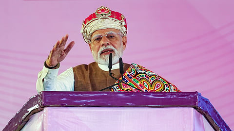 Prime Minister Narendra Modi addresses the gathering during the inauguration of the PM MITRA Park and foundation stone laying ceremony of development works, in Dhar, Madhya Pradesh. 