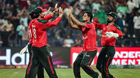 Bangladesh's wicketkeeper and captain Litton Das (R) celebrates with teammates after taking the wicket of Afghanistan's Karim Janat during the Asia Cup 2025 Twenty20 international cricket match between Afghanistan and Bangladesh on September 16, 2025.