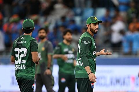 Pakistan's captain Salman Agha (R) reacts at the end of the Asia Cup 2025 Twenty20 international cricket match against India at the Dubai International Stadium in Dubai on September 14, 2025. 