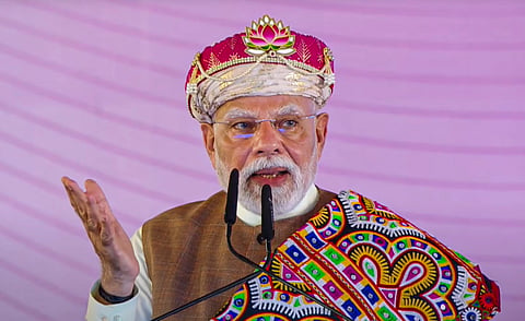 Prime Minister Narendra Modi addresses the gathering during the inauguration of the PM MITRA Park and the foundation stone laying ceremony of development works, in Dhar, Madhya Pradesh. 